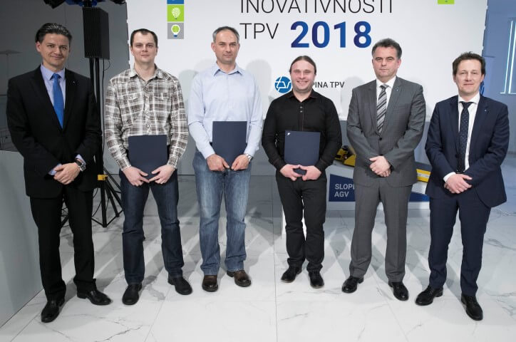 the line up of winners and award presenters at 5th TPV day of innovation standing and posing for a photo